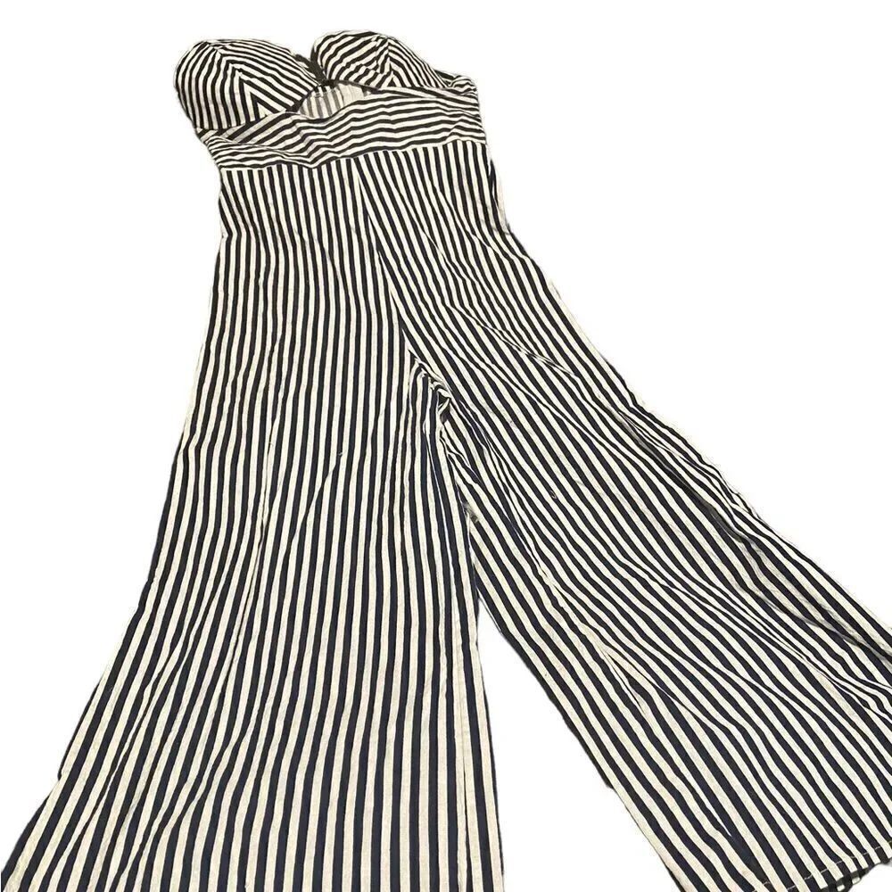 Main Strip size medium strapless capri length jumpsuit excellent condition